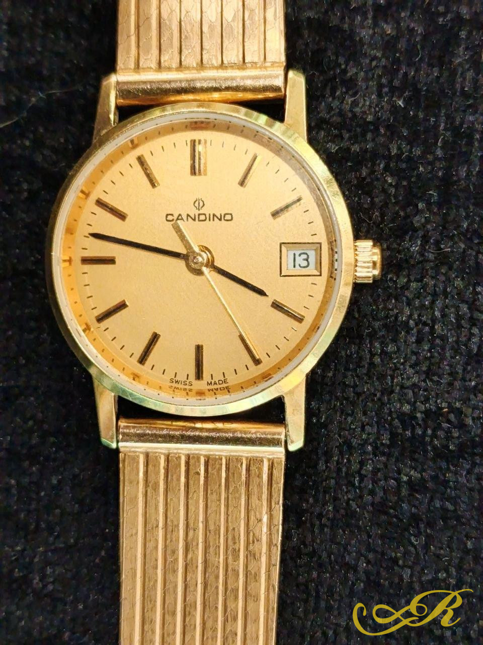 Часы золотые швейцарские "Candino" Винтаж . 585 пробы. Вес 35,6 гр. длина 19 см.