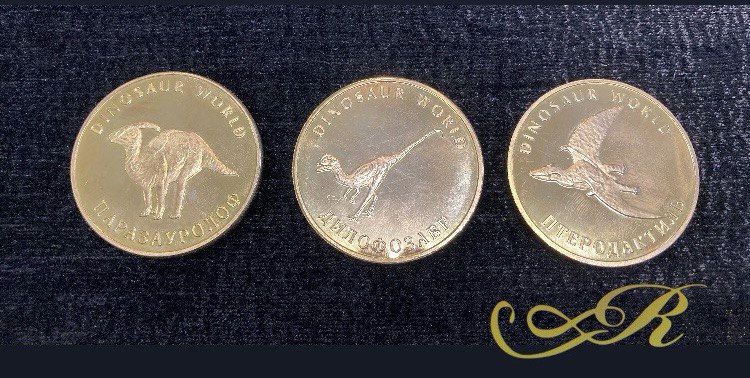 Коллекционные сувенирные монеты " Мир динозавров"