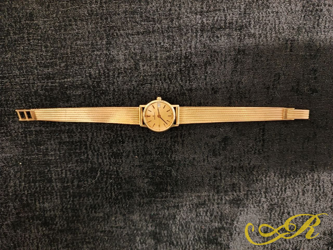 Часы золотые швейцарские "Candino" Винтаж . 585 пробы. Вес 35,6 гр. длина 19 см.