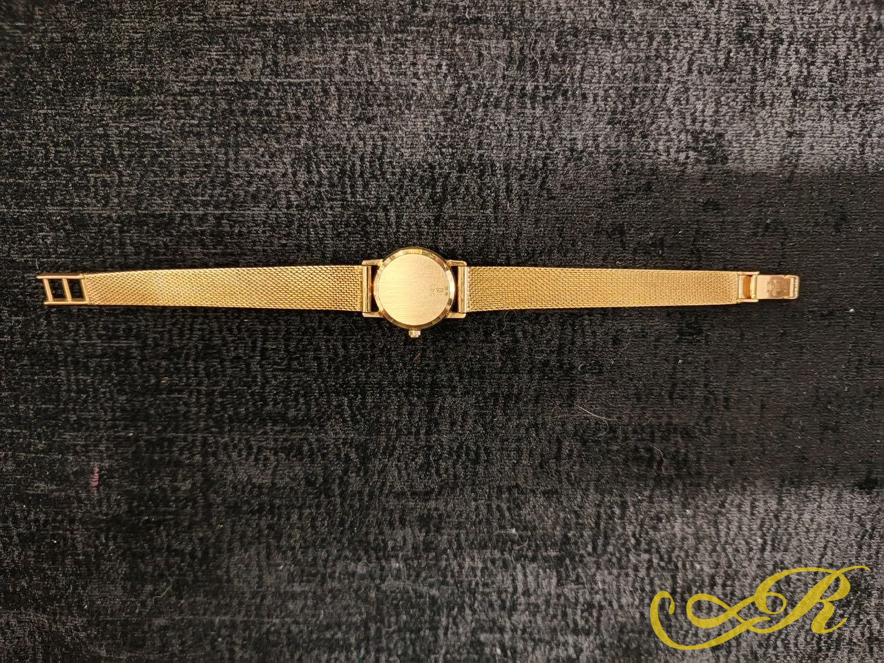 Часы золотые швейцарские "Candino" Винтаж . 585 пробы. Вес 35,6 гр. длина 19 см.