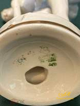 Фарфоровая статуэтка "Балерина в голубом платье надевает пуанты" СССР Дулево.