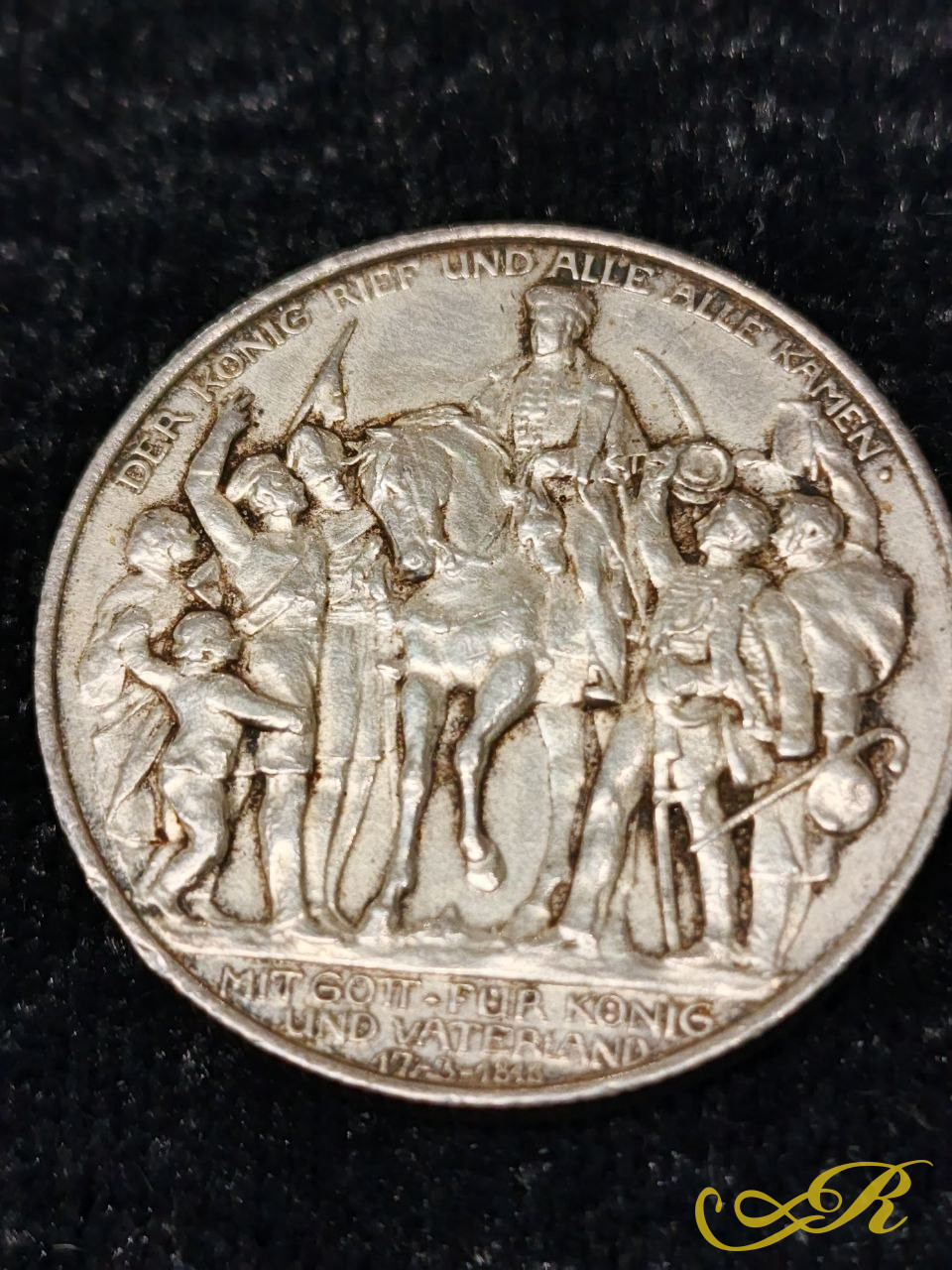  серебряная монета Германской империи (Королевство Пруссия) достоинством 2 марки 1913 года, выпущенная в честь столетия воззвания короля Фридриха Вильгельма III «К моему народу» и начала войны против Наполеона. На реверсе изображен прусский орел, бо